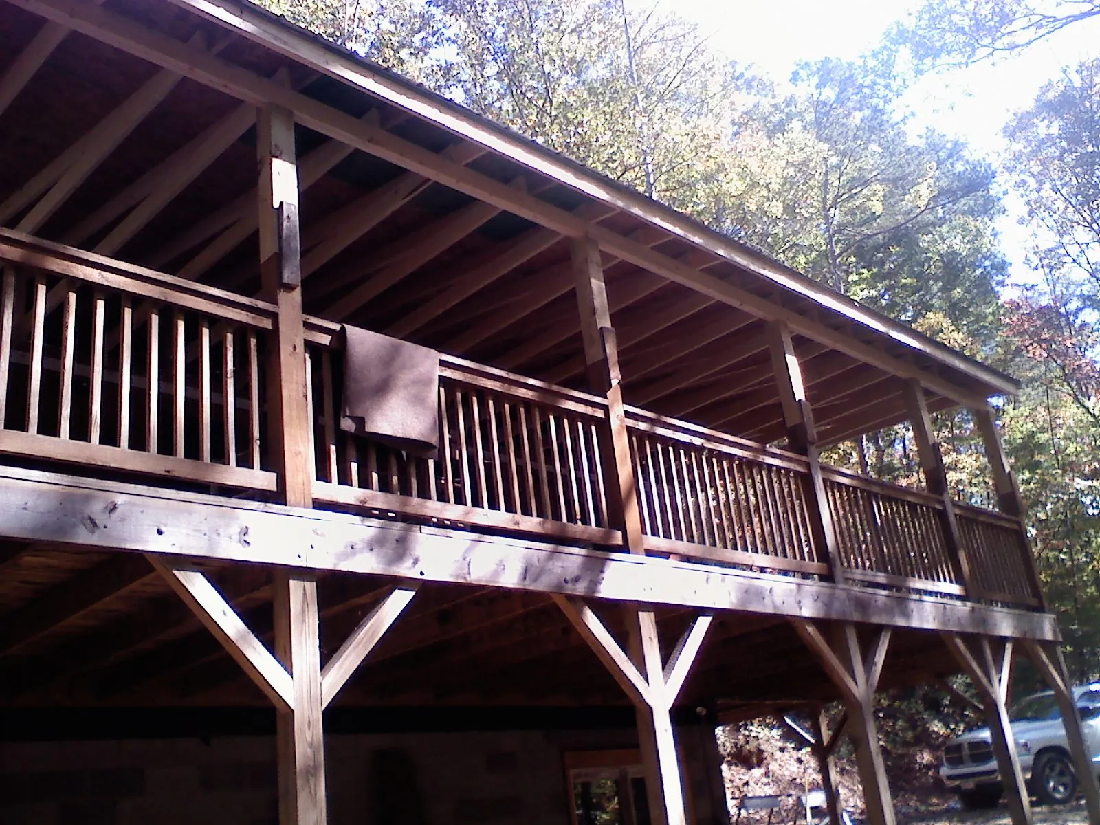 Timber framing under a new elevated porch and deck — Roof Leak Repair in South Lebanon by Roofing Brothers